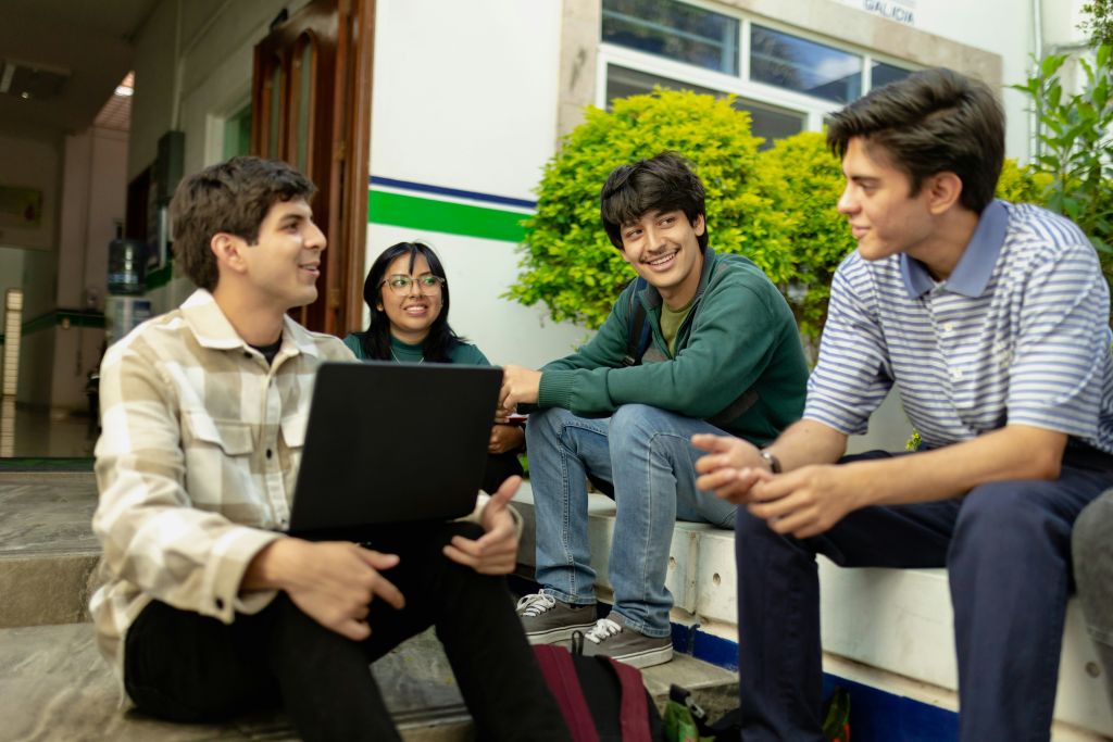 Students talking outdoors.